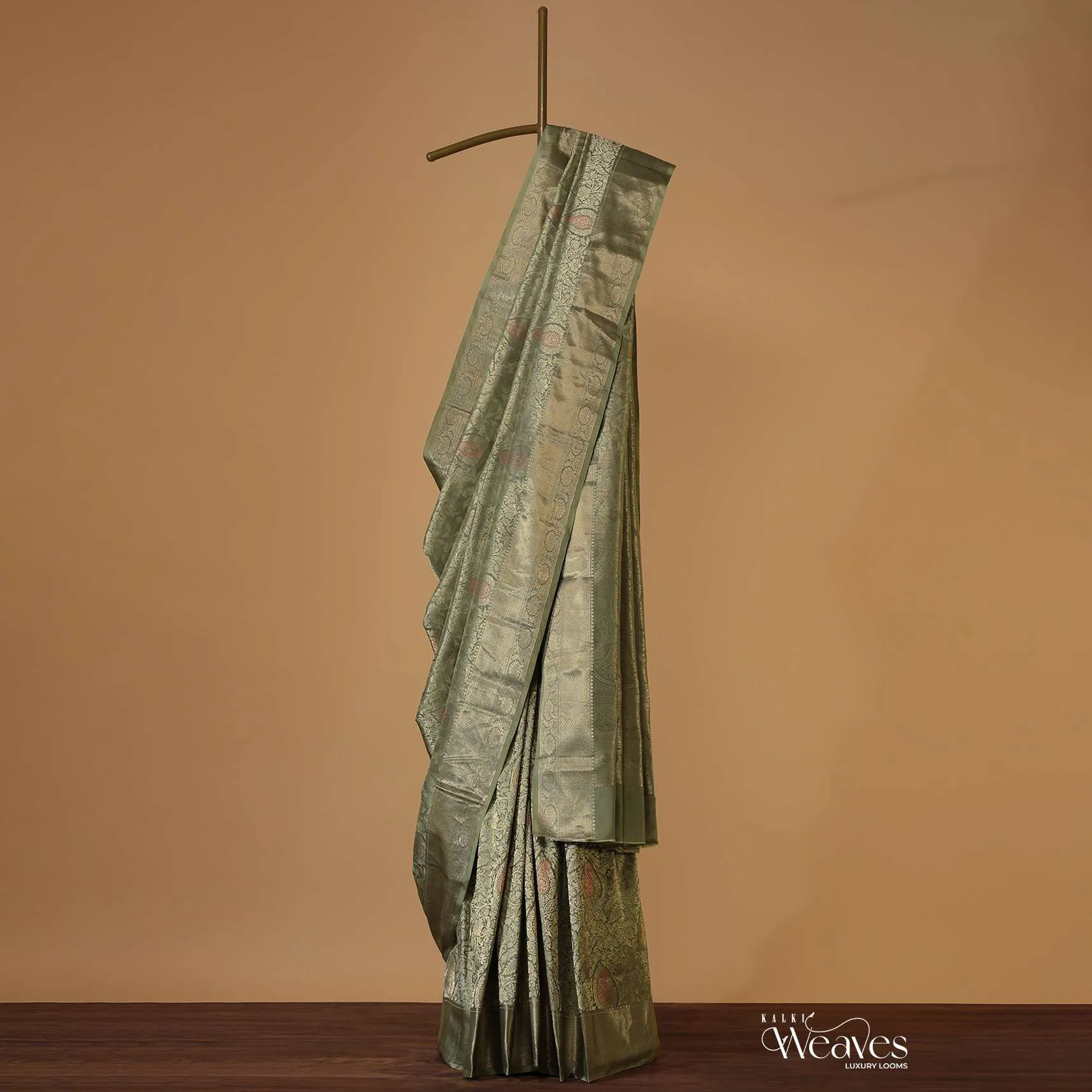 Moss Green Kanjivaram Saree In Pure Uppada Silk With Weave And An Unstitched Blouse