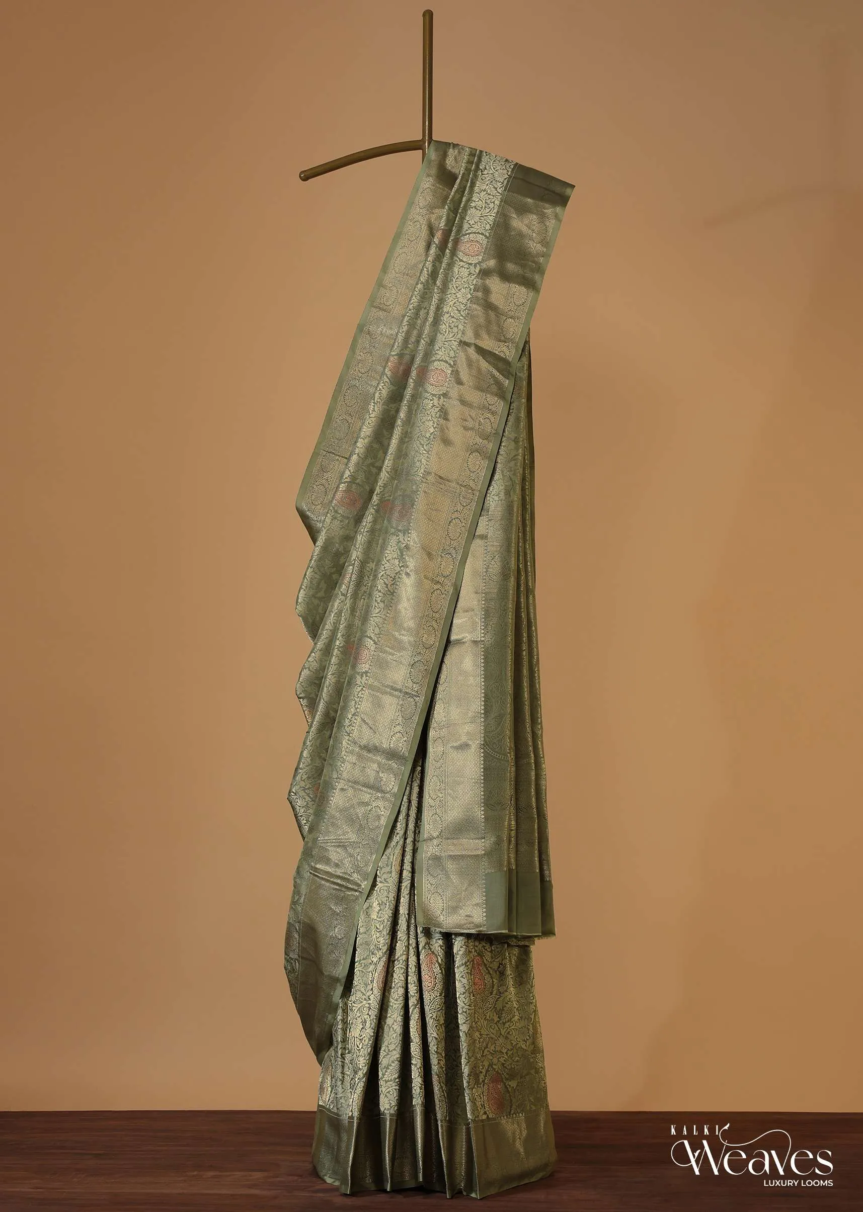 Moss Green Kanjivaram Saree In Pure Uppada Silk With Weave And An Unstitched Blouse